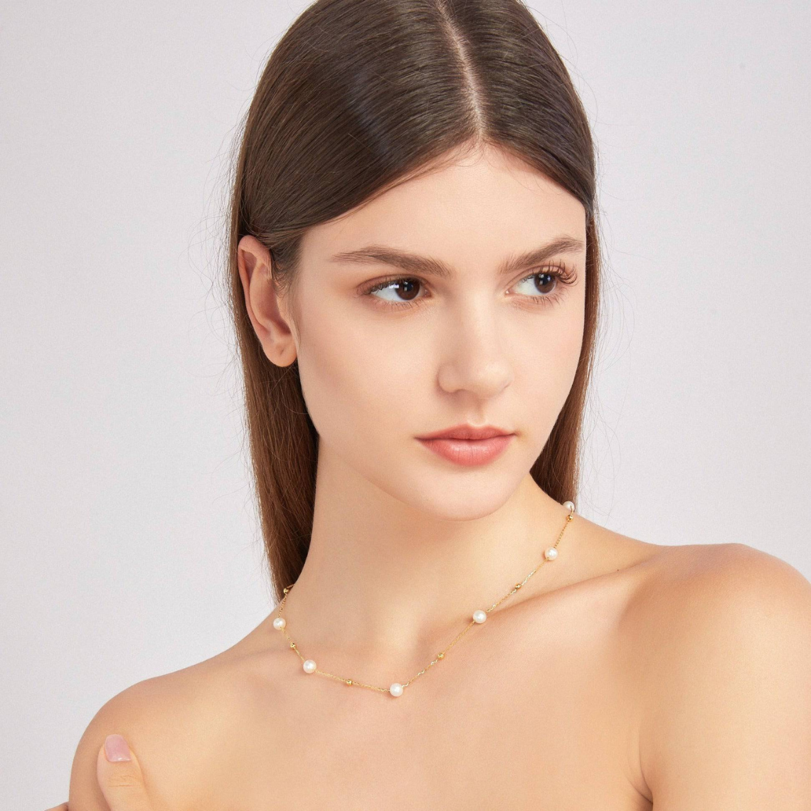 Gold and pearl necklace - alternating pearls and gold chain