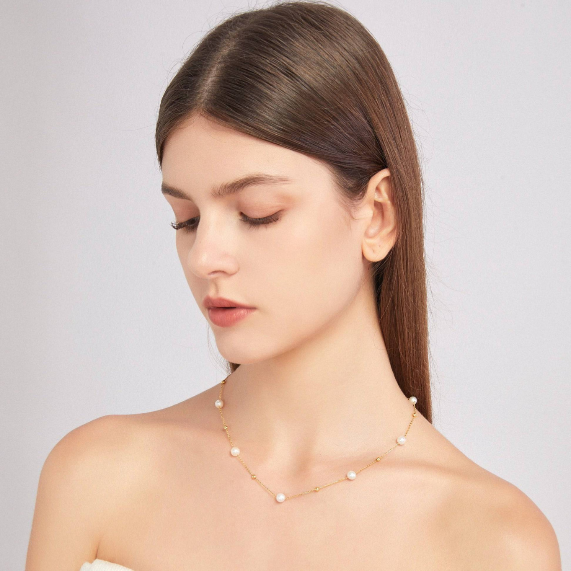 Gold and pearl necklace - alternating pearls and gold chain
