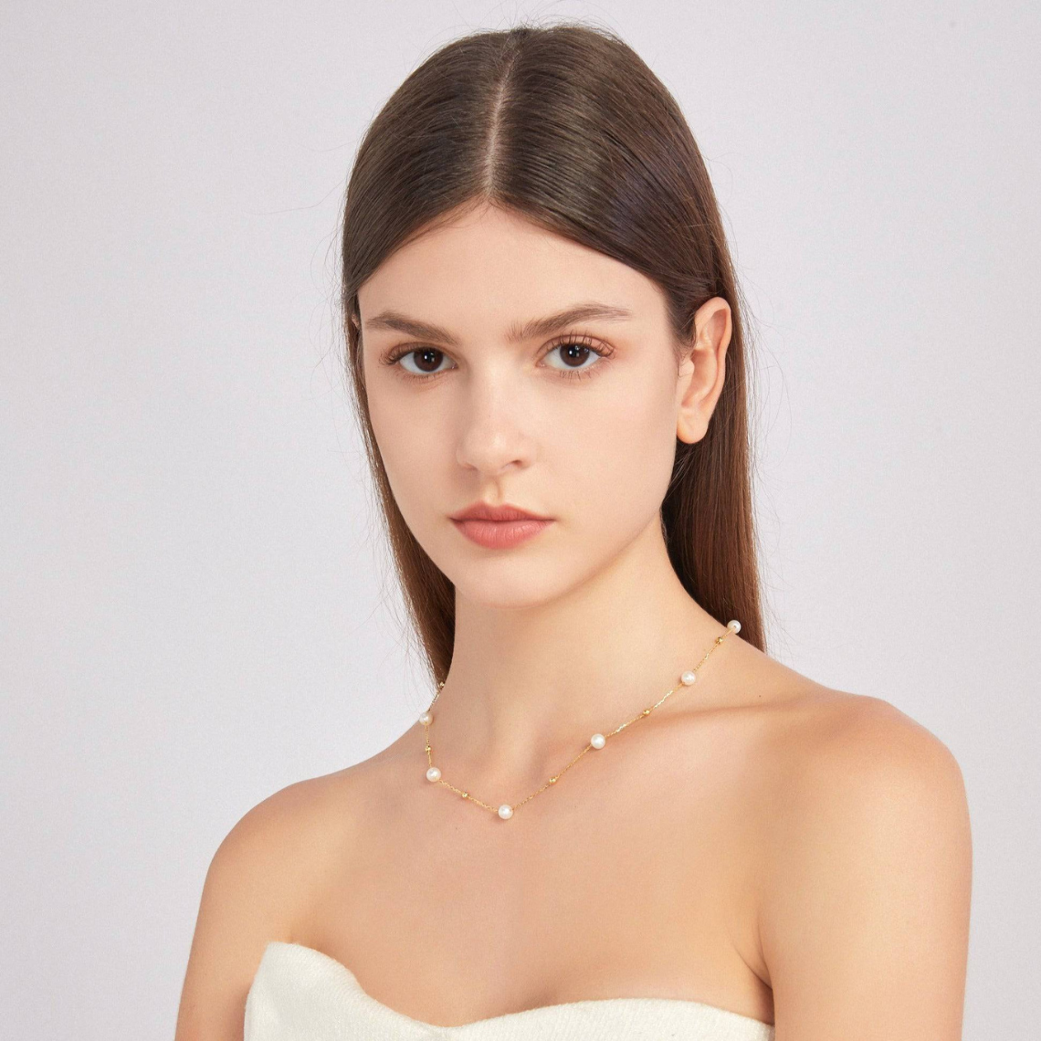 Gold and pearl necklace - alternating pearls and gold chain
