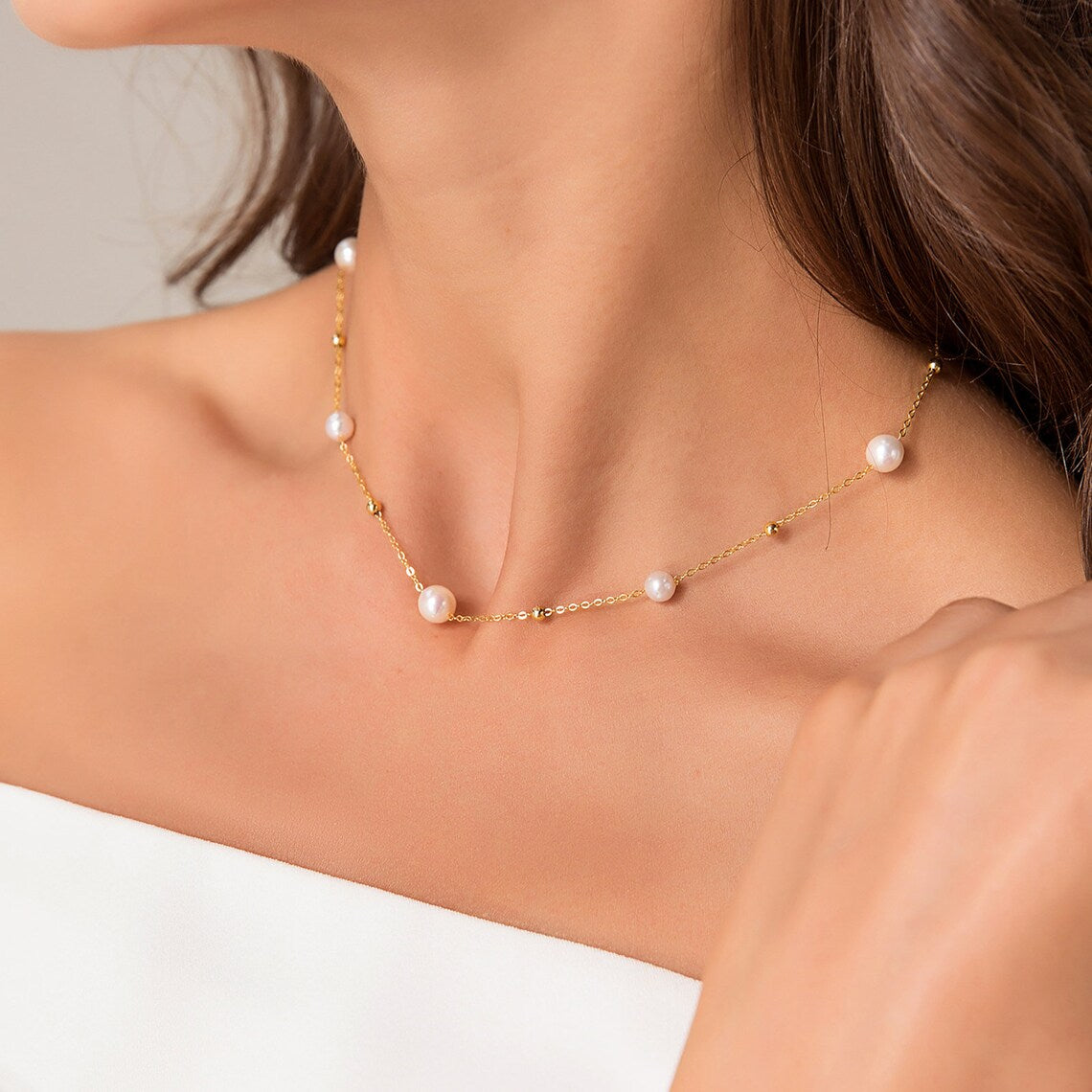 Gold and pearl necklace - alternating pearls and gold chain