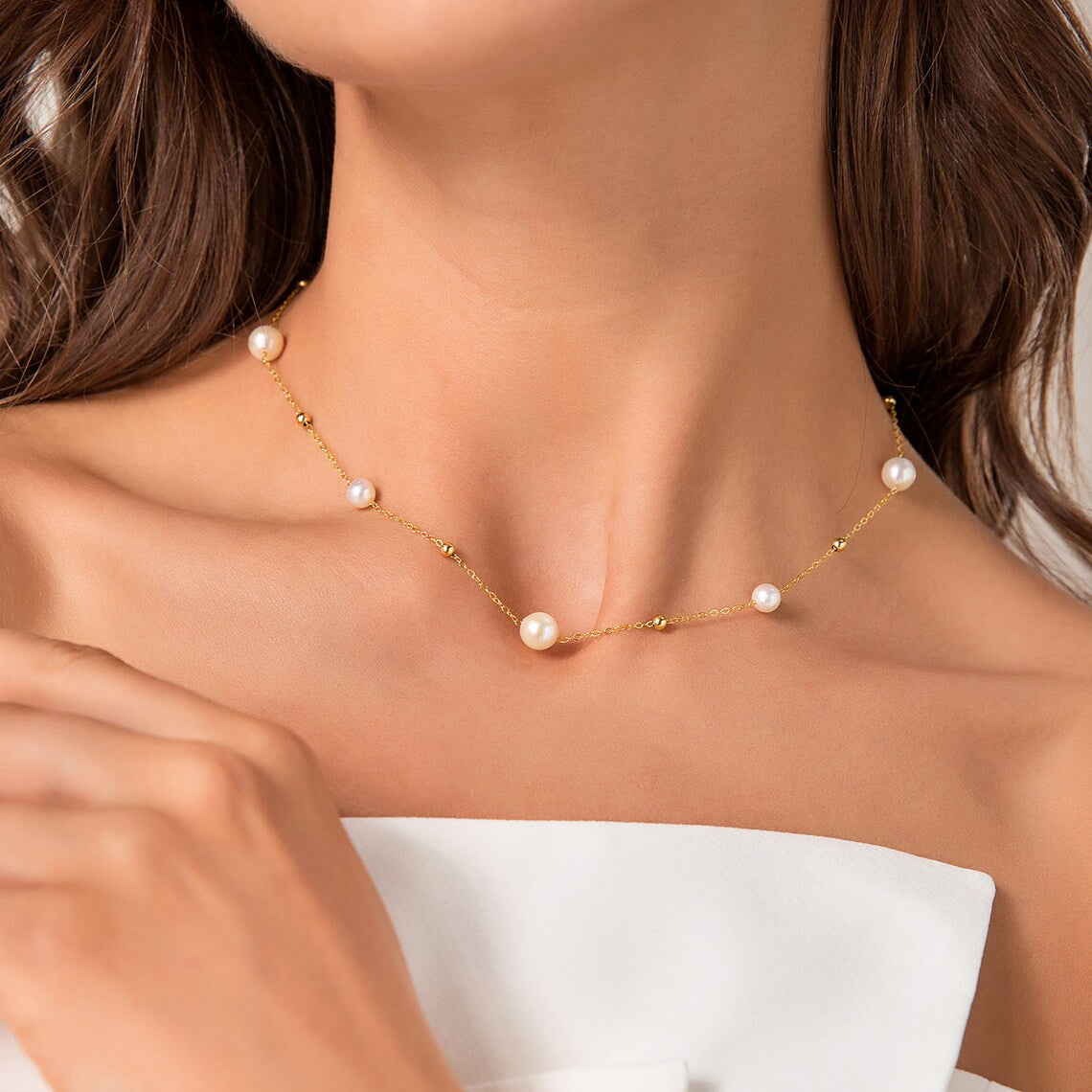 Gold and pearl necklace - alternating pearls and gold chain